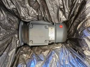 lot 284 image: NEW AEG Spain 13HP .25KW 120V Motor