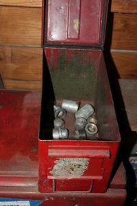 lot 173 image: Ammo Box With Unused Pipe Fittings