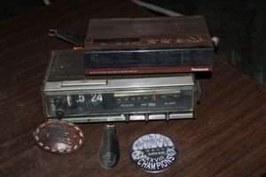 lot 182 image: Vintage Alarm Clock Radios, Belt Buckel And More