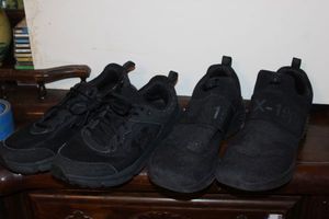 lot 90 image: Size 10.5 Black Sketchers and size 9 Black Under Armor Shoes