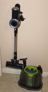 lot 89 image: Rechargeable, Height Adjustable Stick Vac and Bissell Litte Green Pro Heat Machine