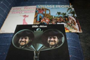 lot 379 image: Vintage Willie Nelson Album and The Pink Panther and The Village People