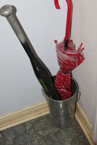 lot 419 image: Baseball Bat Umbrella and Galvanized Holder