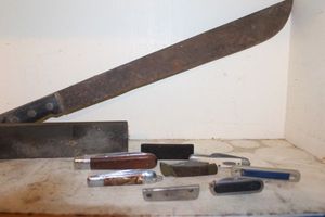 lot 191 image: Variety of Pocket Knives, Sharpening Stones and Machete
