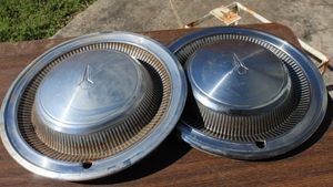lot 216 image: Vintage Oldsmobile Hubcaps