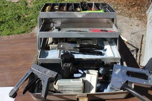 lot 225 image: Aluminum Box full of tools and accessories  including air Powered staple gun and Manual staplers and Much More