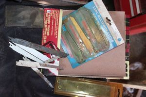 lot 227 image: Reciprocating saw Blades and Sand Paper