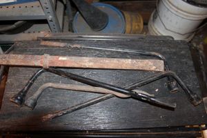 lot 256 image: Tire Irons and Heavy Pry Bar