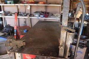 lot 239 image: Heavy duty can crusher and Table Vise... Bring Tools To Remove