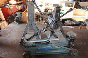 lot 244 image: Jack Stands, Floor Jack and Tire Irons