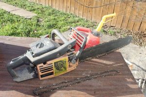lot 251 image: Timber Bear Gas Powered Chainsaw and small Gas Can
