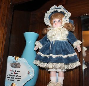 lot 44 image: Porcelain Doll, Vase, and Small Tray