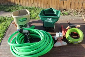 lot 15 image: Garden Hose Sprinklers and Seed Spreaders