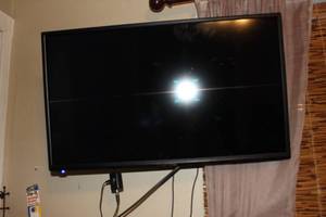 lot 357 image: LED 27 TV With Wall Mount Antenna And Feet For Tabletop Use