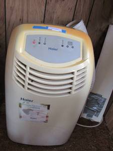 lot 10 image: Haier inside portable AC unit