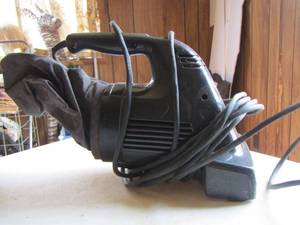 lot 22 image: Black and Decker hand held vacuum