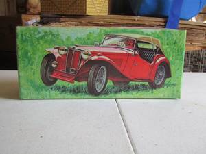 lot 30 image: 1936 MG Tai winds after shave 5fl oz.