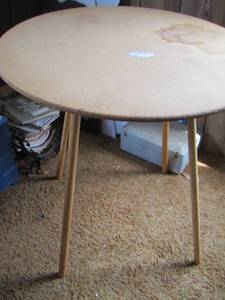 lot 52 image: small oval table comes apart for easy storage