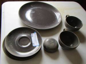 lot 61 image: Dark grey set of dishes