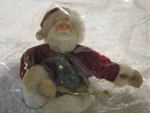 lot 100 image: Santa shirt pin back is broke