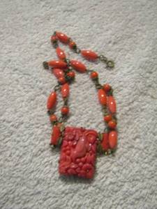 lot 105 image: celluloid coral necklace