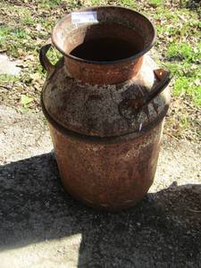 lot 235 image: Milk can, bottom is rotted