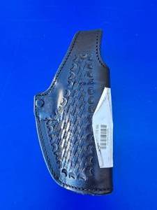 lot 28 image: Vintage Leather Strong H345 498 Smith & Wesson Holster