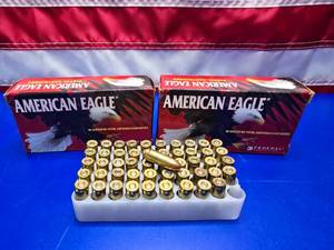 lot 79 image: American Eagle 9mm 124gr FMJ Ammo.  50 Rounds Per Box.  QUANTITY 2 BOXES.  BID IS TIMES THE QUANTITY