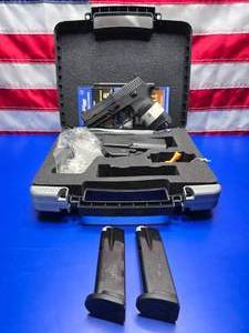 lot 105 image: NEW Sig Sauer P250C Compact .40S&W Double Action Pistol w 2 Magazines