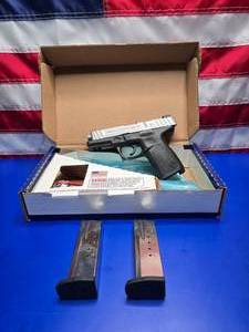 lot 155 image: NEW Smith & Wesson SD40 VE .40cal Pistol w 4 Barrel & 2 Magazines.
