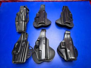 lot 220 image: Lot of 6 Glock 17 Leather Holsters.  Gould & Safariland