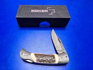 lot 255 image: Boker Plus Demascus Blade Folding Knife