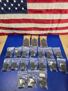 lot 99 image: Large Lot of Magpul MAG002-BLK AR15 Magazine Assists