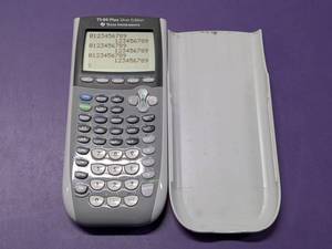 lot 23 image: Texas Instruments TI-84 Plus Silver Edition Graphing Calculator