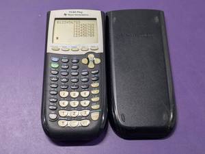 lot 35 image: Texas Instruments TI-84 Plus Graphing Calculator