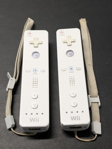 lot 64 image: Lot of 2 - Nintendo Wii Wireless Controllers RVL-003