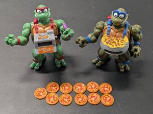 lot 93 image: Lot of 2 - Teenage Mutant Ninja Turtles Classic Pizza Tossin