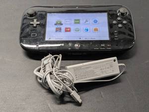 lot 103 image: Nintendo Wii U GamePad 32GB Black Handheld System WUP-010(USA)