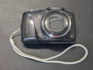 lot 188 image: Canon PowerShot SX130 IS 12.1MP Digital Point-n-Shoot Camera
