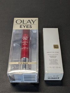 lot 197 image: Olay Eyes Depuffing Eye Roller 0.2fl oz & Kristin ESS Working Serum for Hair 1.7fl oz - NEW