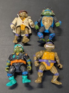 lot 210 image: Lot of 4 - Vintage Ninja Mutant Turtle Toy Figurine 1990-1991