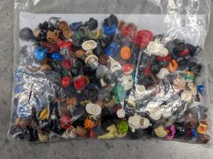 lot 282 image: 25oz of Lego Head Gear Bundle