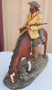 lot 1 image: Western cowboy and horse statue, original price new $250.00-- pretty cool piece