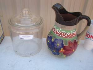 lot 71 image: clear glass cookie jar with lid- brown floral handled pottery  pitcher