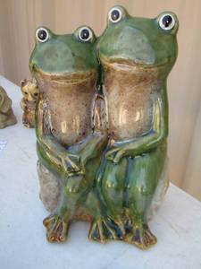 lot 60 image: frog couple posing for a picture