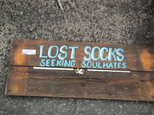 lot 119 image: Lost socks seeking soul mates wood sign