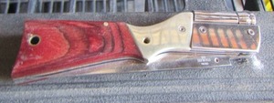 lot 188 image: pocket knife opens to look like a rifle