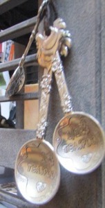 lot 221 image: ORNATE EMBOSSED MEASURING SPOONS