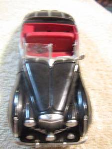 lot 23 image: 1947 Bentley model car missing a few pieces