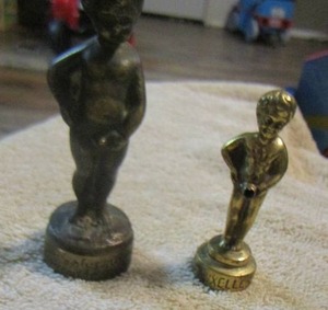 lot 125 image: very heavy little boy statues